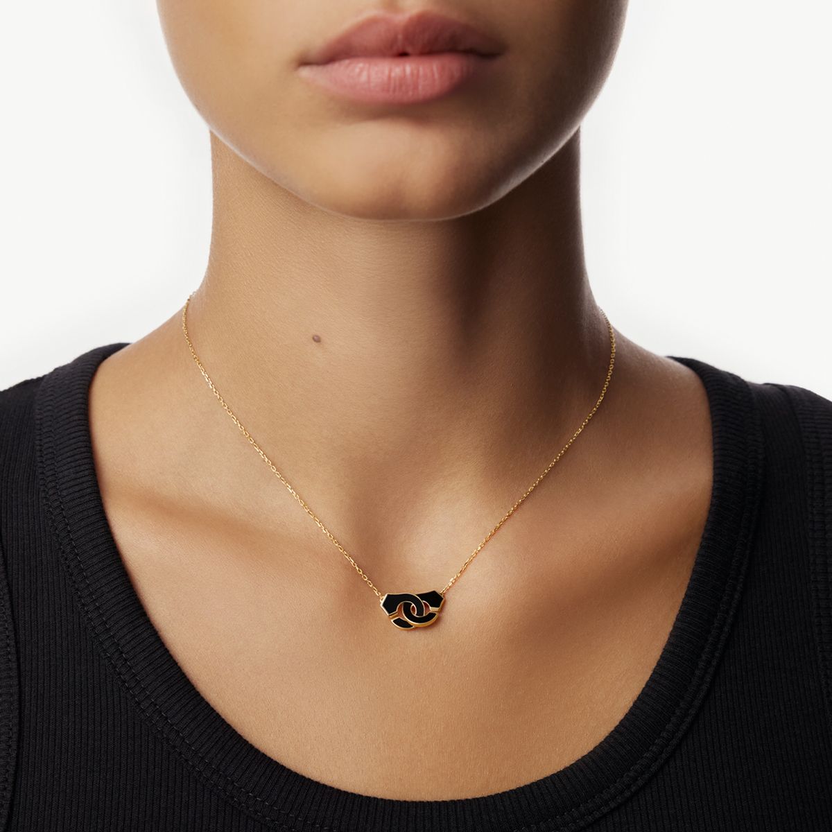 Collier Menottes dinh van onyx petit modèle 